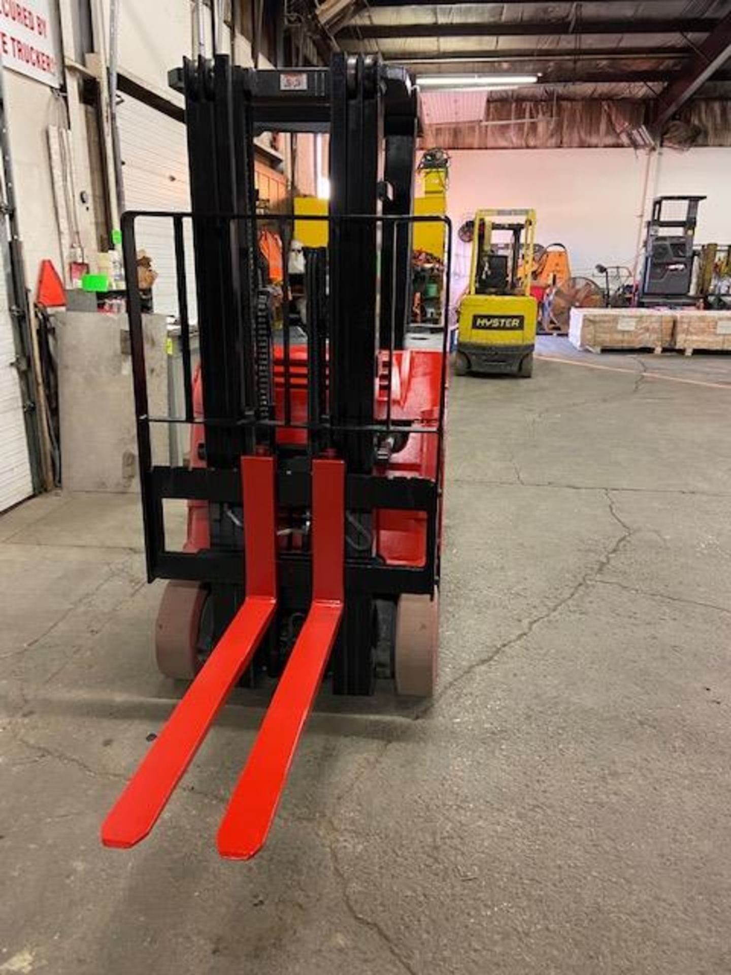 FREE CUSTOMS - 2013 Raymond 5000lbs Capacity Stand On Forklift Electric with 3-STAGE MAST sideshift - Image 2 of 3