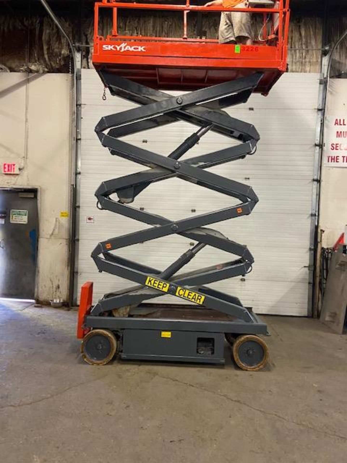 SkyJack III Electric Scissor Lift model 3226 - 26 feet lift, 32 inch width deck with pendant