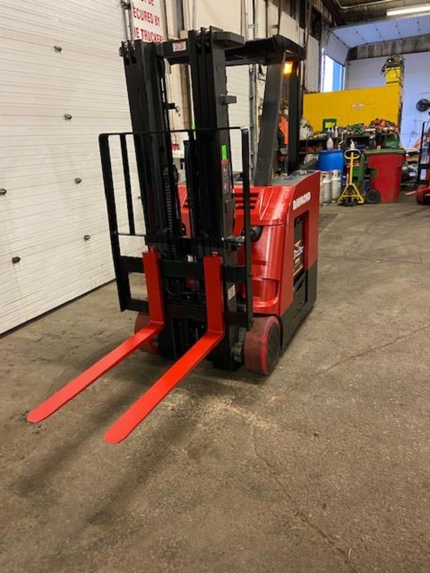 FREE CUSTOMS - 2015 Raymond 5000lbs Capacity Stand On Forklift Electric with 3-STAGE MAST sideshift - Image 2 of 3