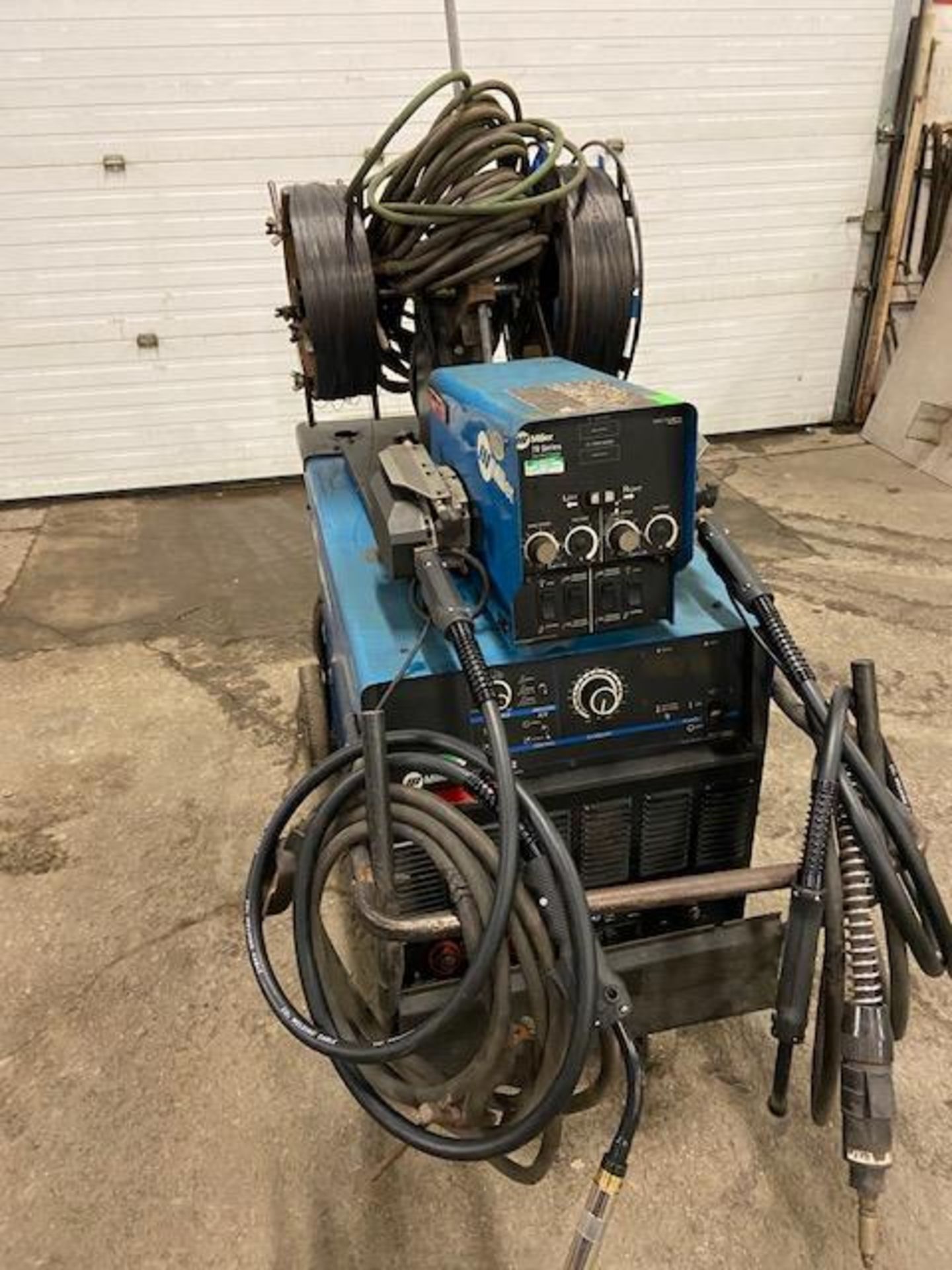 Miller Dimension 652 Mig Welder 650 Amp Mig Tig Stick with DUAL 70 Series Wire Feeder with 2 Mig