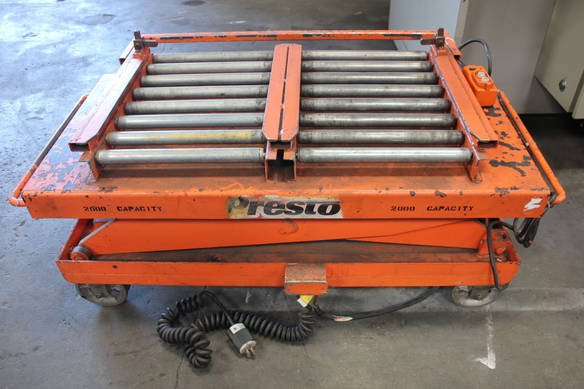 Presto Hydraulic Scissor Lift Table 2,000 Lbs. x 48'' x 24''. LOADING FEE FOR THIS LOT: $50