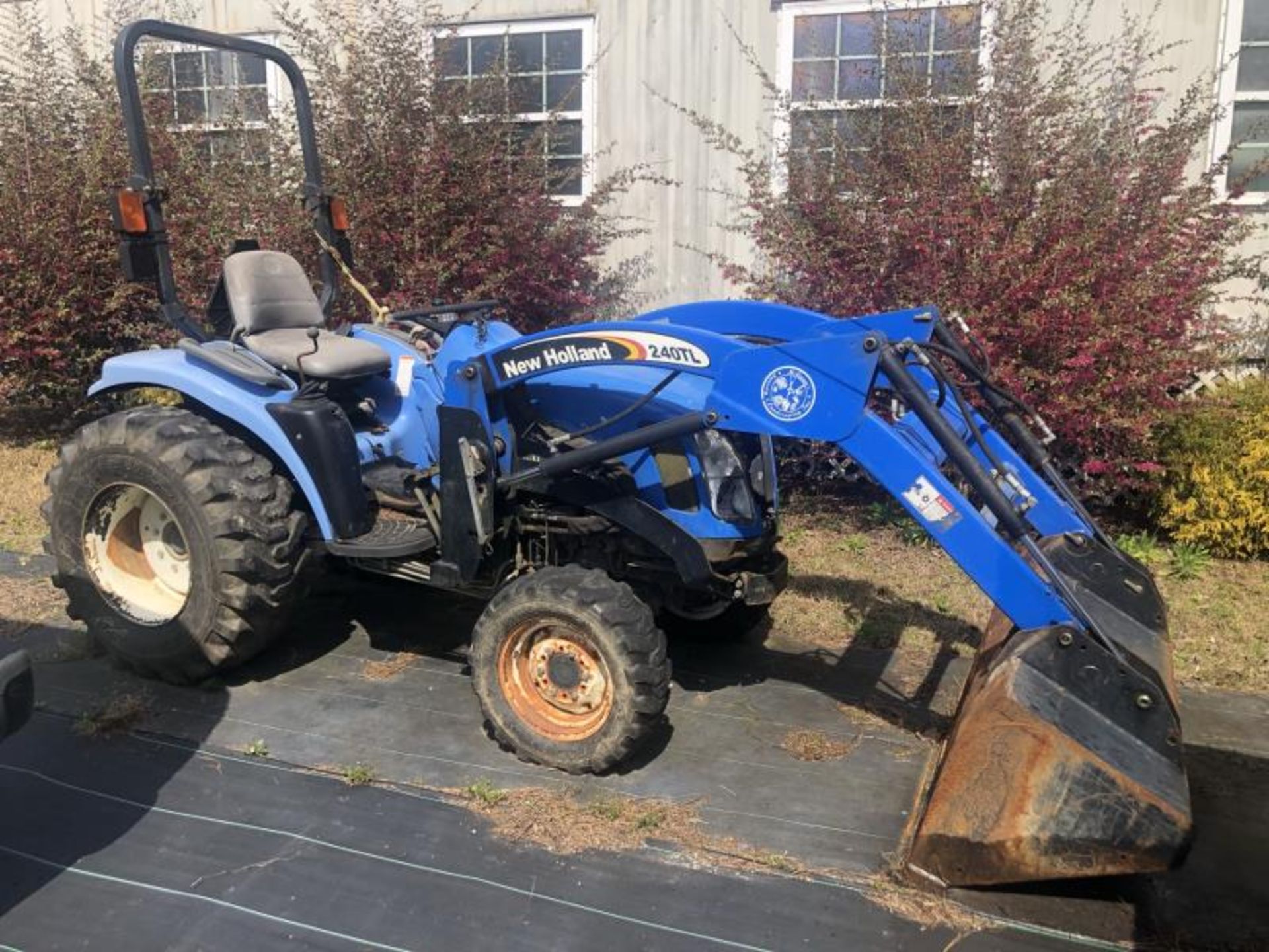 Tractor by New Holland Model: TC33DA w/ 240TL Bucket, 2,049.7 Hours, SN:G100372 / 4A13D