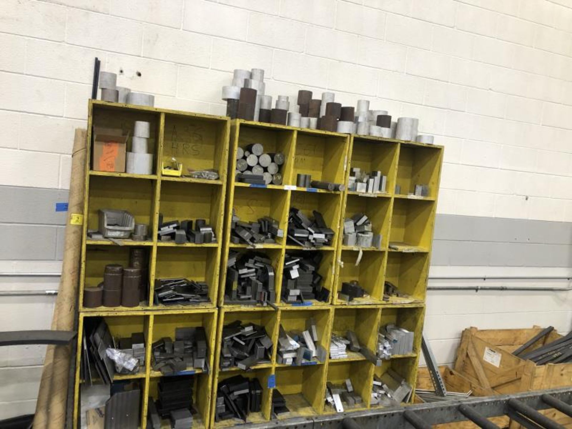 Yellow box with contents of Metal Scrap / Stock