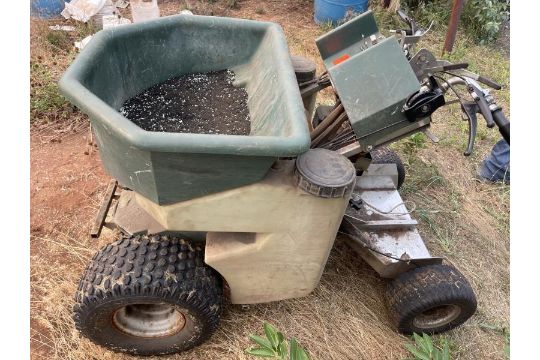 Ride-On fertilizer spreader with 978 hours, started cord will not retract. - Image 3 of 7