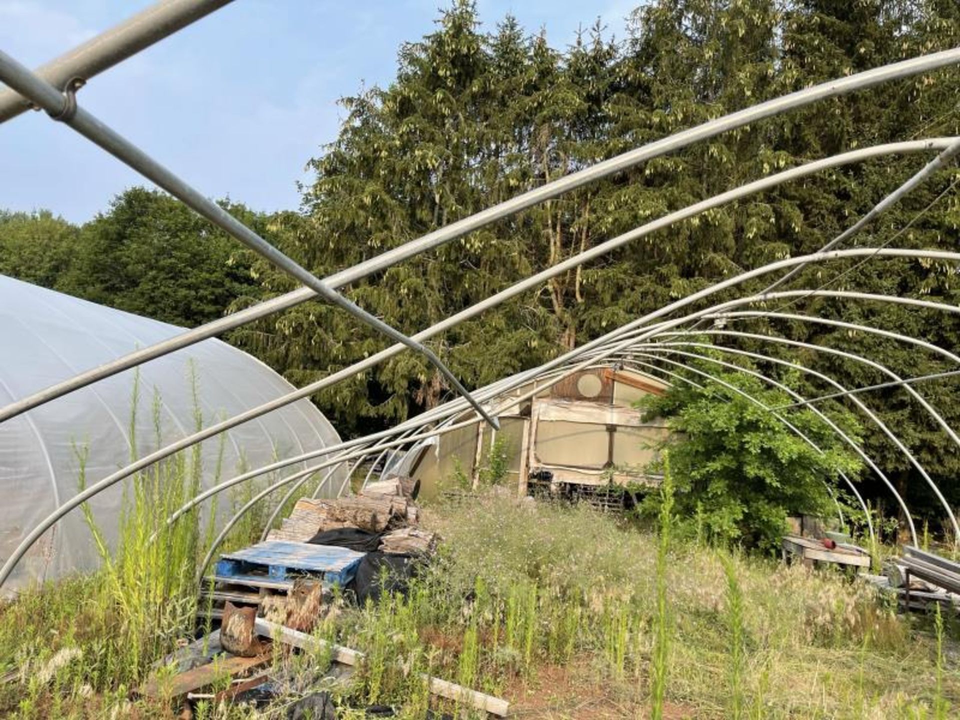 Greenhouse 27' wide 28 hoops, most are bent, disconnected at ground level, fan not included - Image 5 of 7