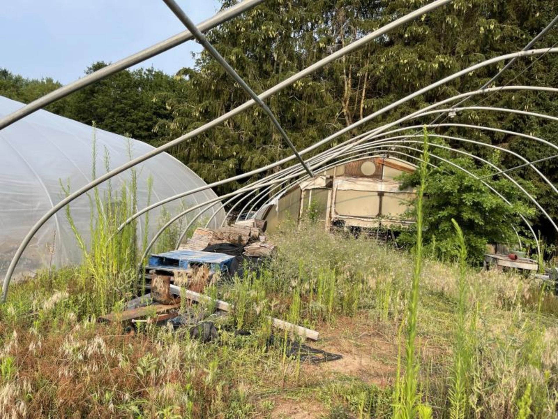 Greenhouse 27' wide 28 hoops, most are bent, disconnected at ground level, fan not included - Image 6 of 7