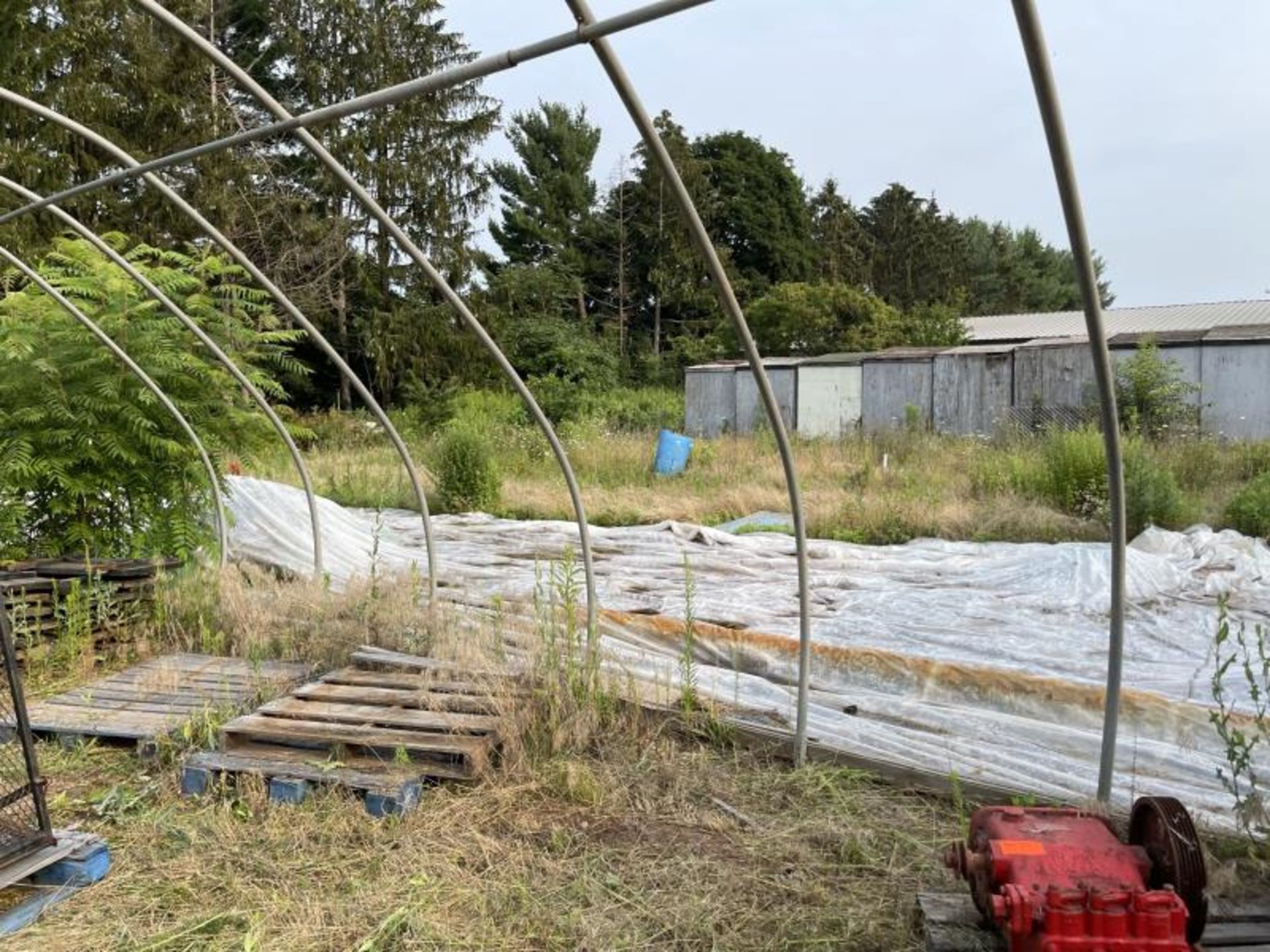 Greenhouse 27' wide 28 hoops, most are bent, disconnected at ground level, fan not included - Image 4 of 7