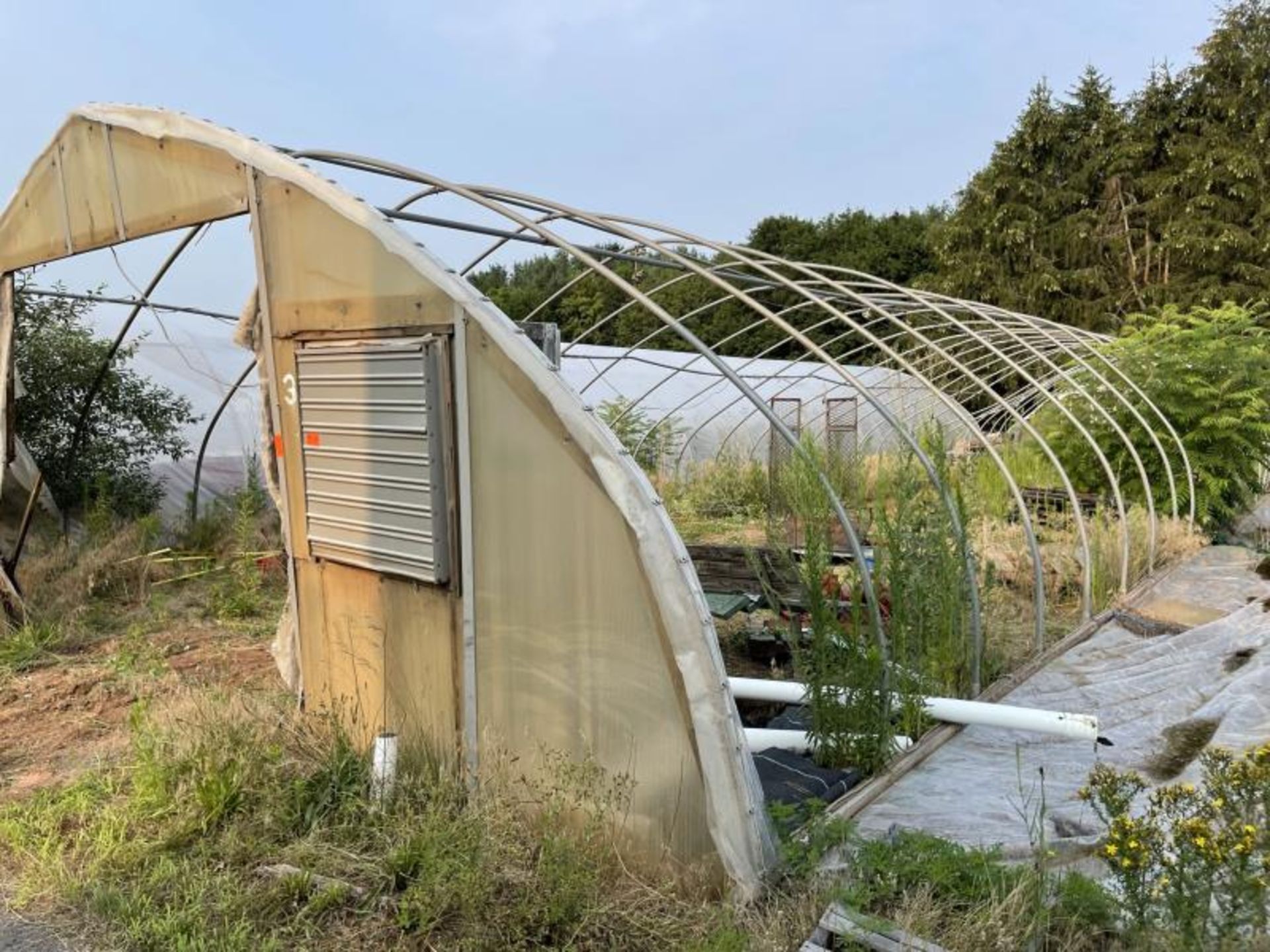 Greenhouse 27' wide 28 hoops, most are bent, disconnected at ground level, fan not included