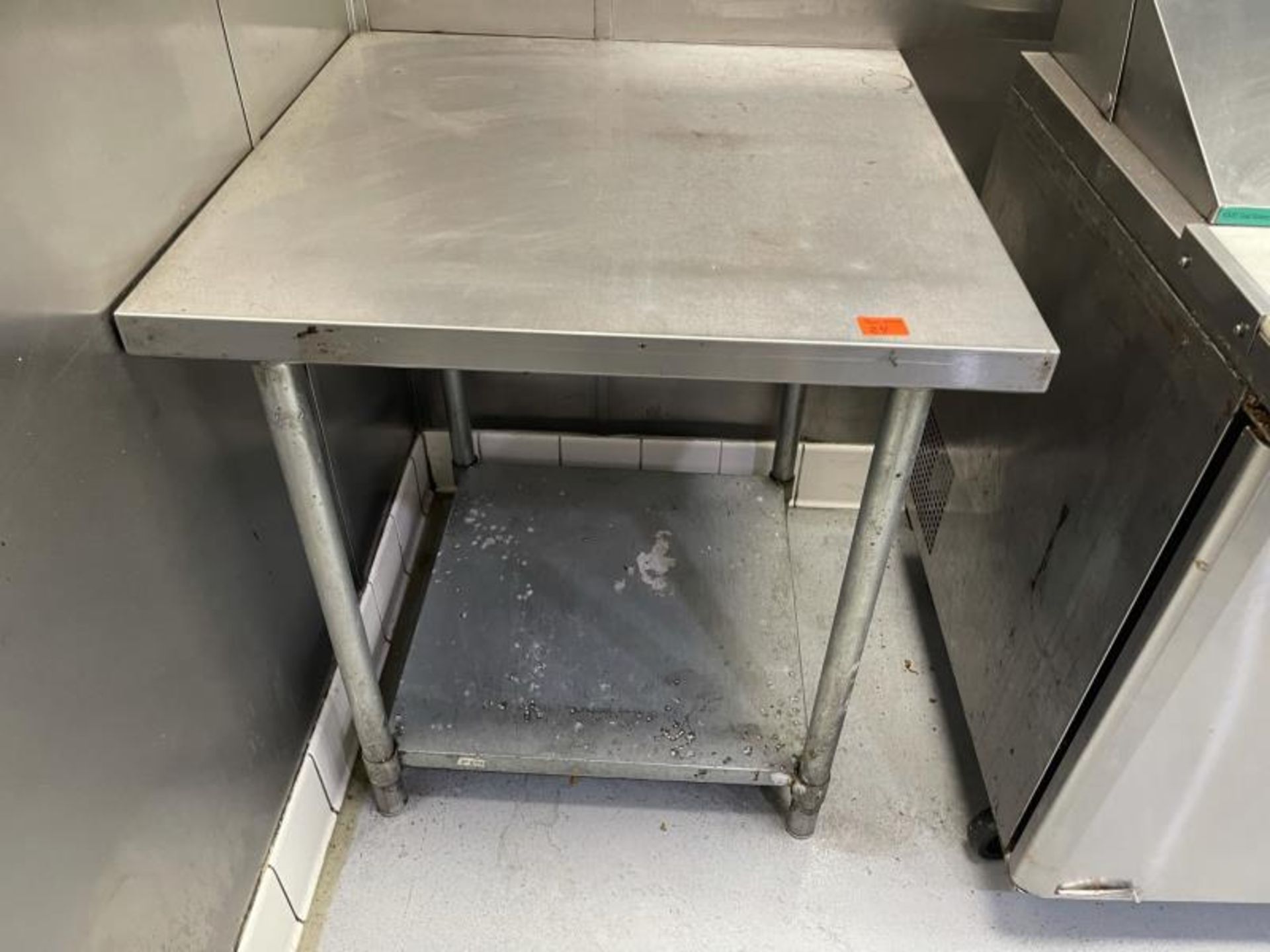 Stainless Steel table with lower shelf 30"x30"