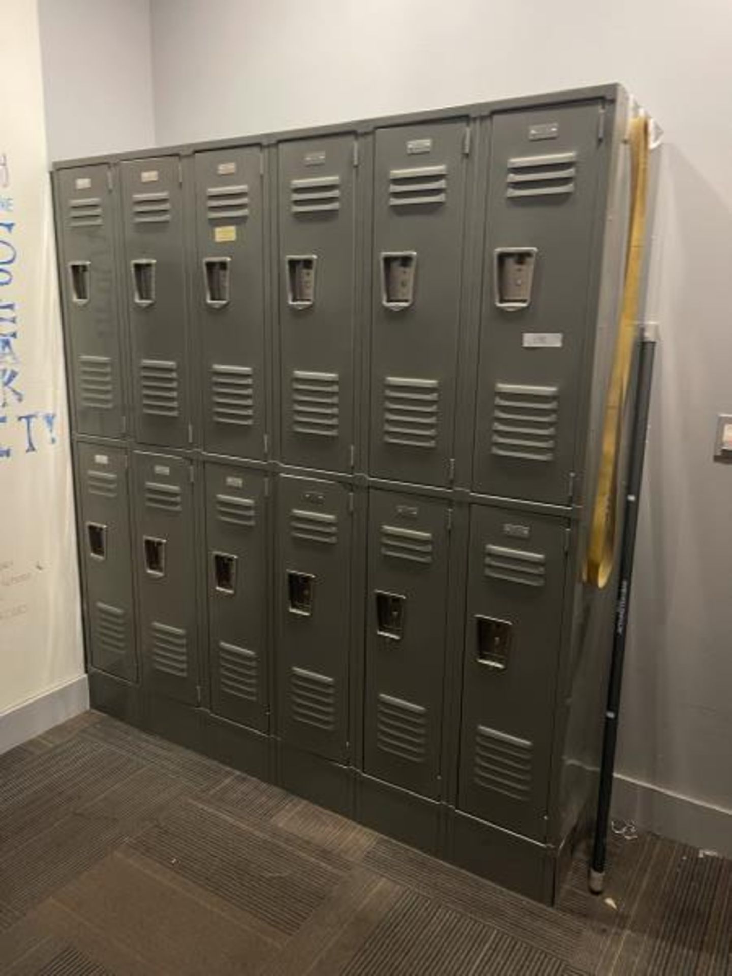 Metal 12 Compartment Locker by Shelves In