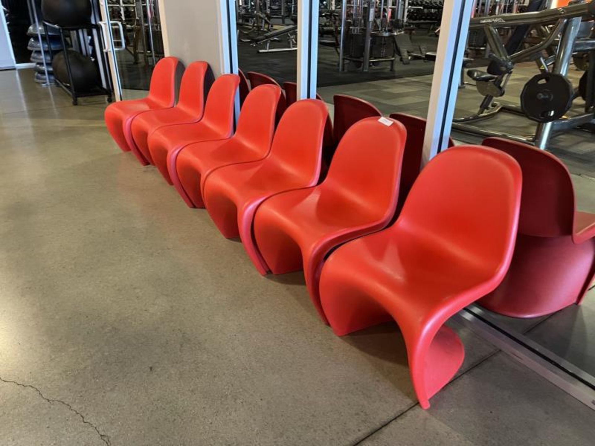 Lot of 7 Red Molder Plastic Chairs