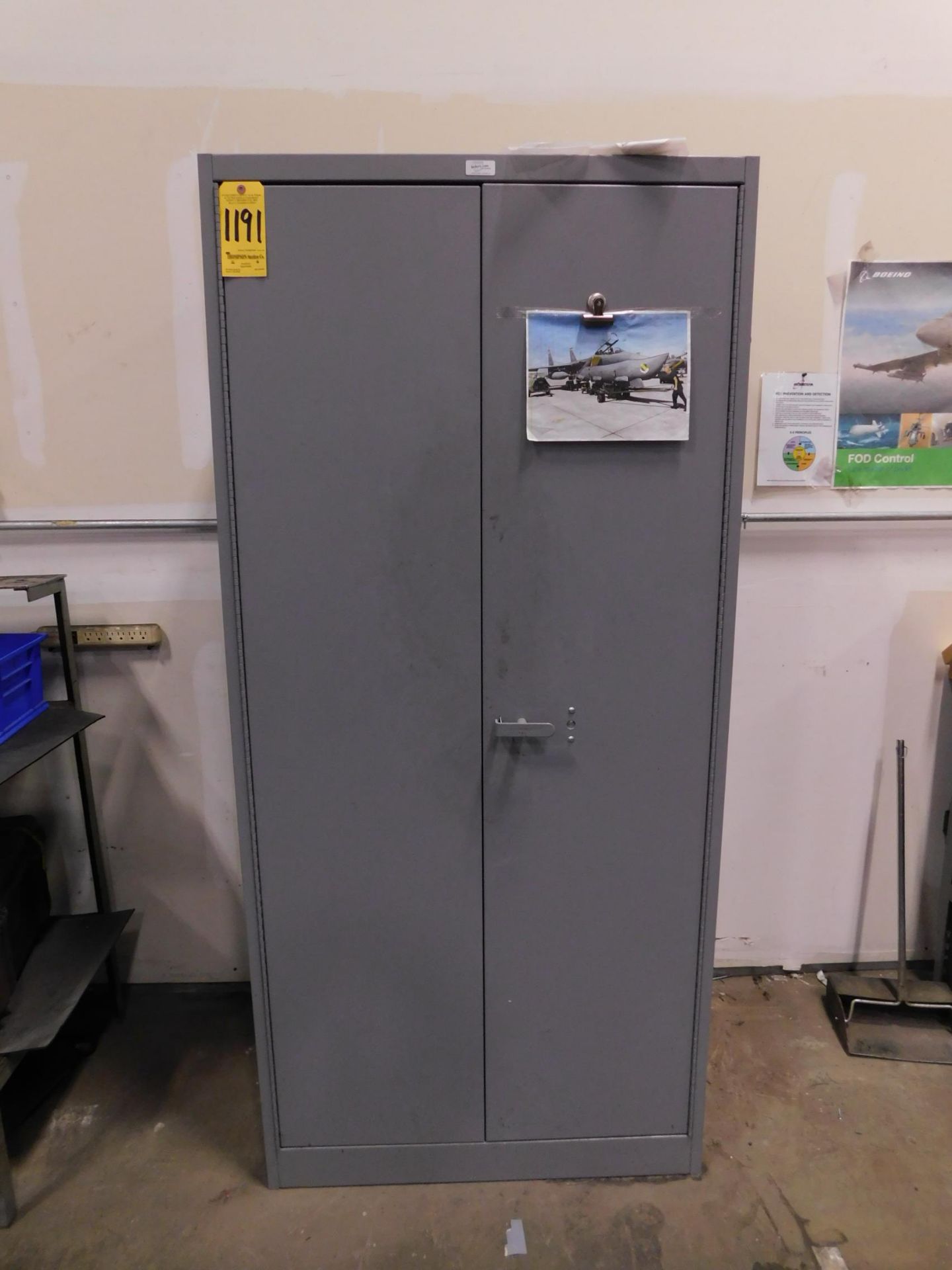 2-Door Metal Upright Storage Cabinet and Contents