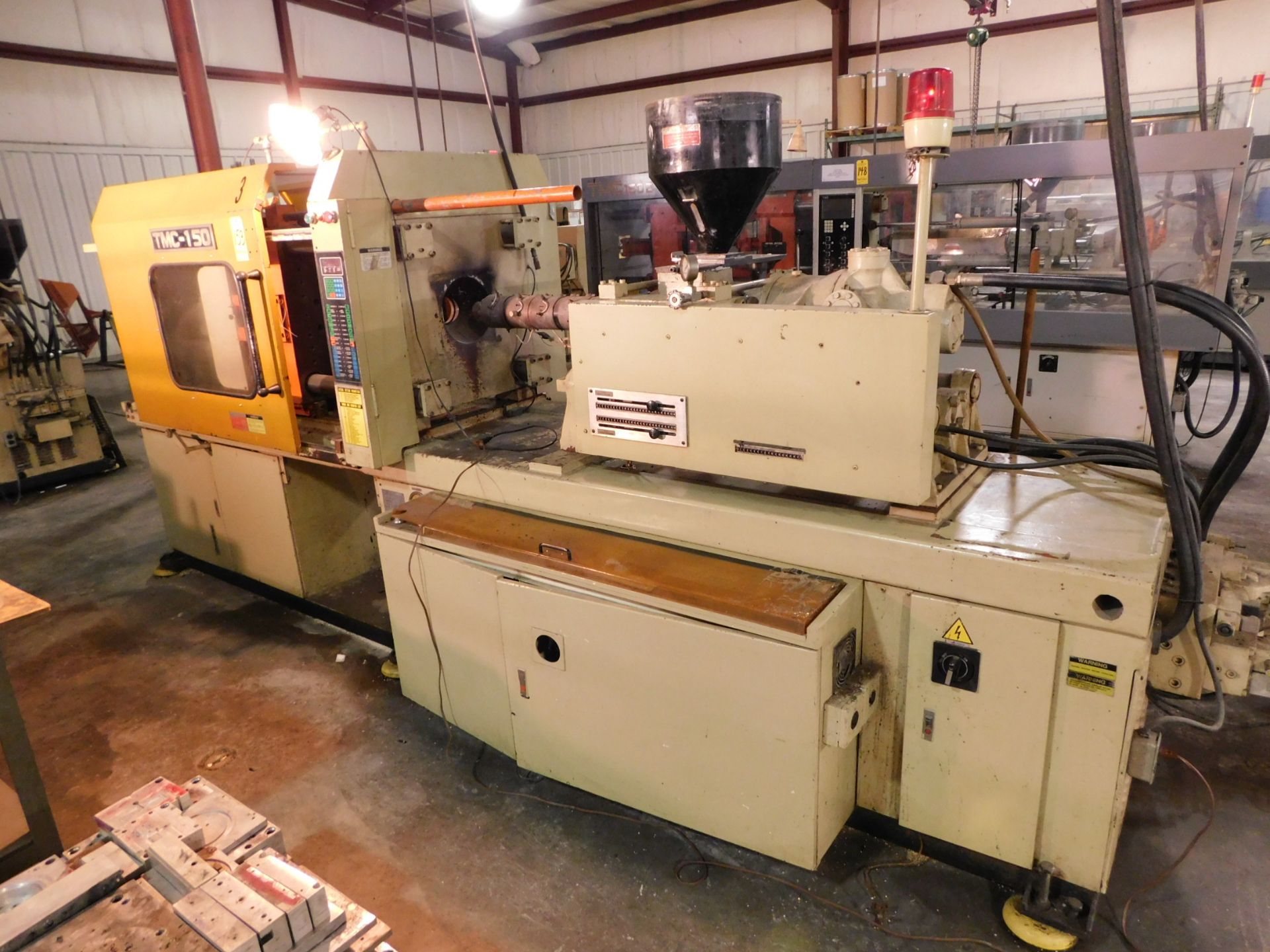 TMC Model TMC-150 Plastic Injection Molding Machine, s/n 880530, New 1988, 150 US Tons, 9.26 Oz.