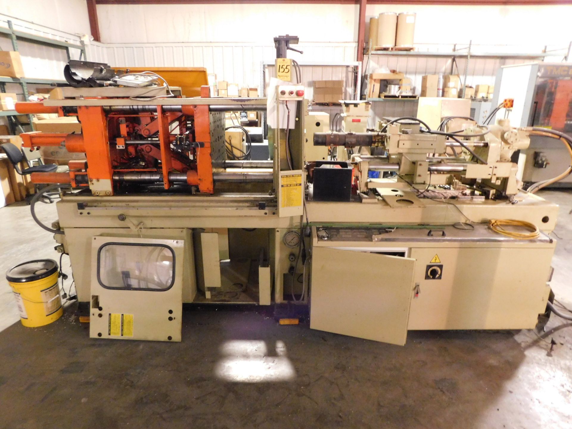 TMC Model TMC-A90 Plastic Injection Molding Machine, s/n 9110044, New 1991, 90 U.S. Ton, 6.7 Oz.