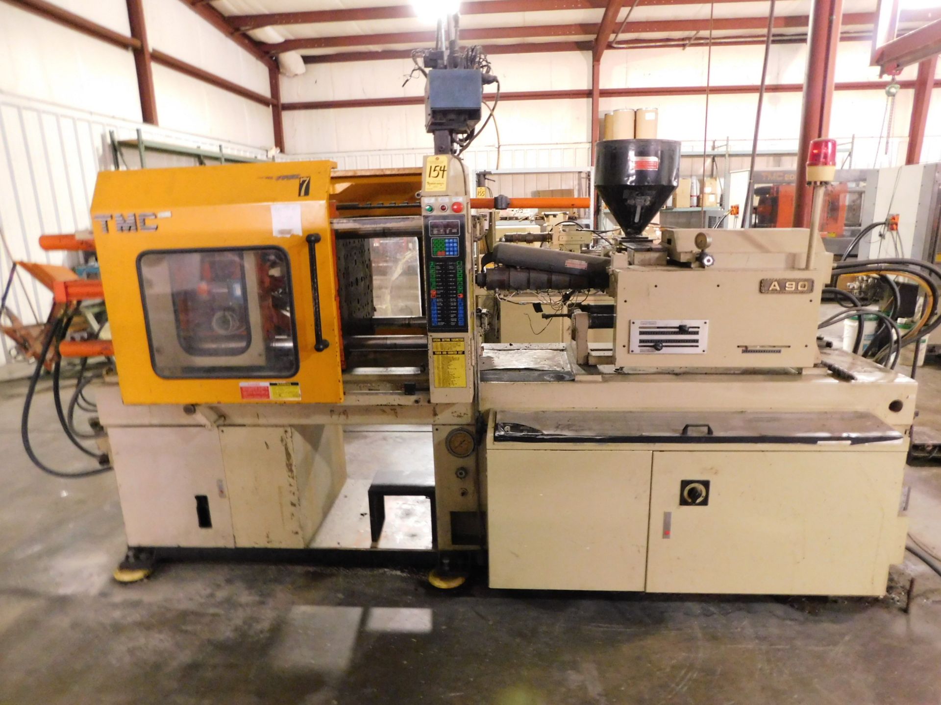 TMC Model TMC-A90 Plastic Injection Molding Machine, s/n 9009057, New 1990, 90 U.S. Ton, 5.59 Oz.