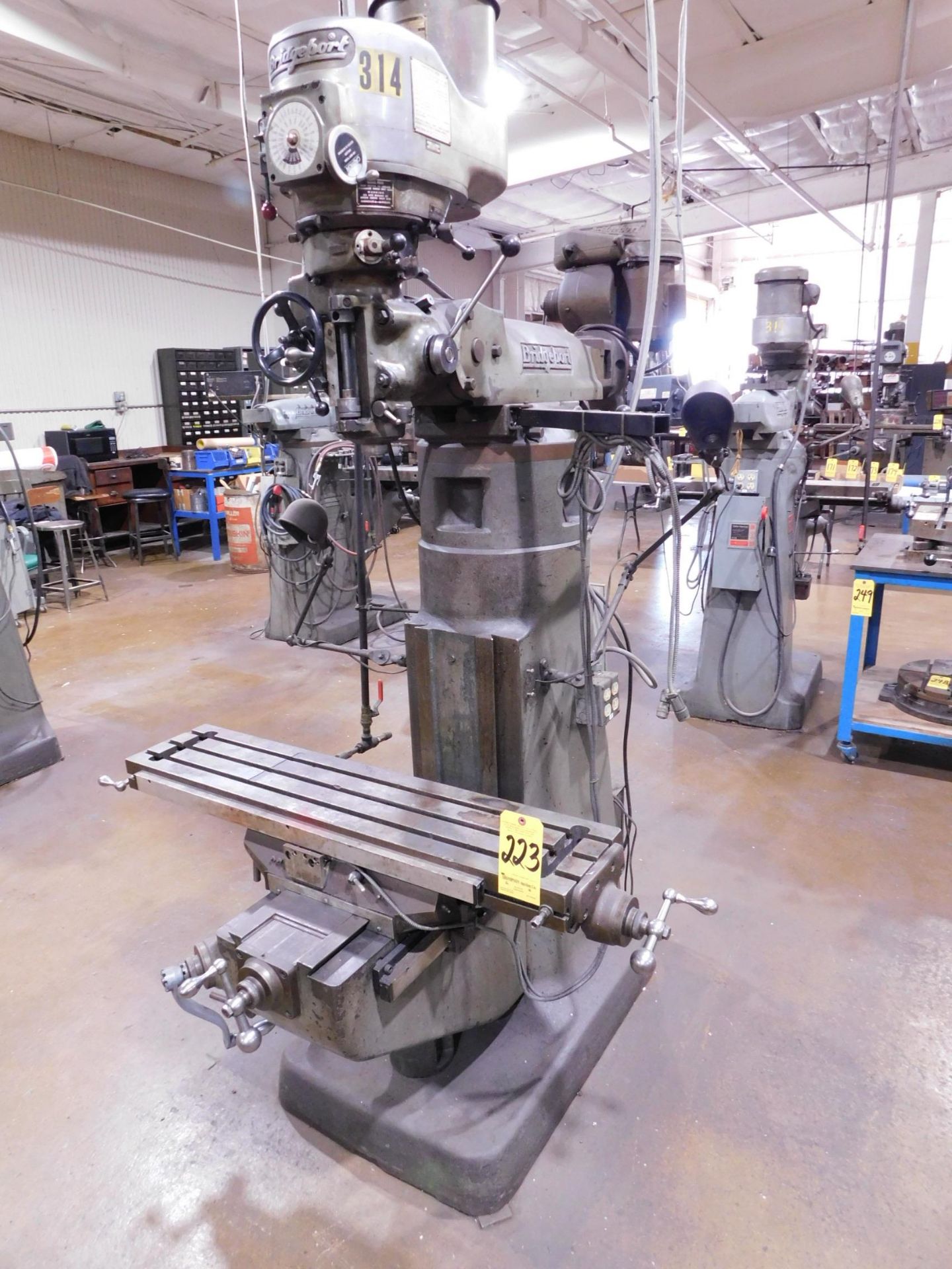 Bridgeport 1 1/2 HP Vari-Speed Vertical Mill, s/n 12BR110542, 9" X 42" Table, 7" Riser Block, Shapin