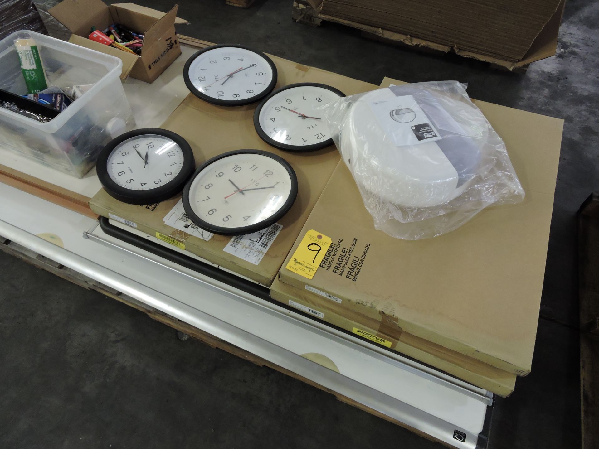 Pallet of White Boards and Clocks
