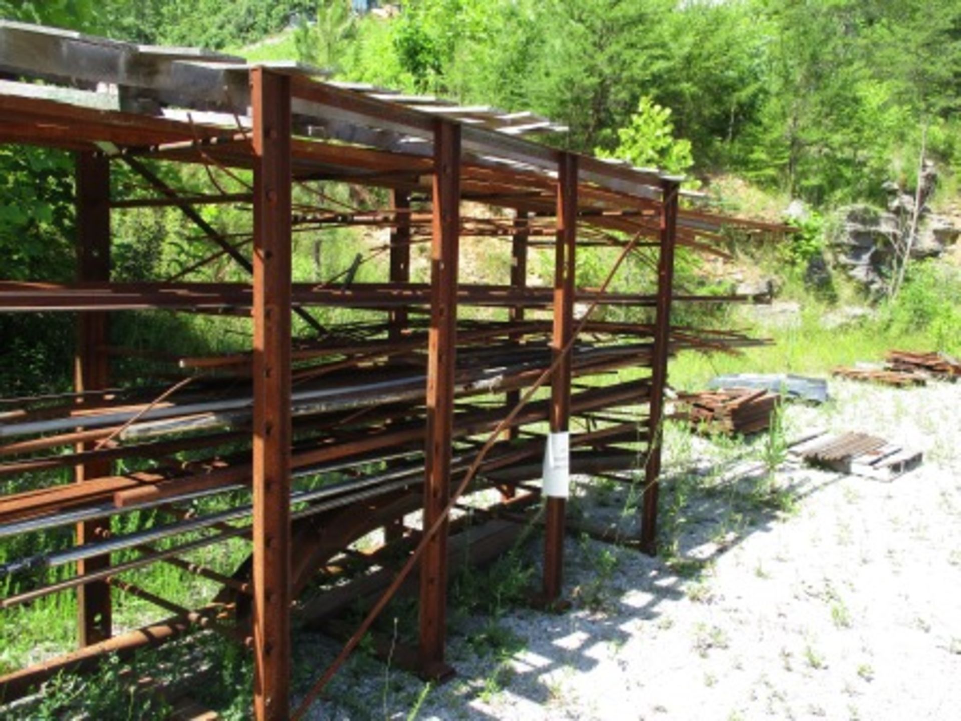 Steel Storage Rack and Contents, and (10) Skid Lots of Scrap Metal and Plastic