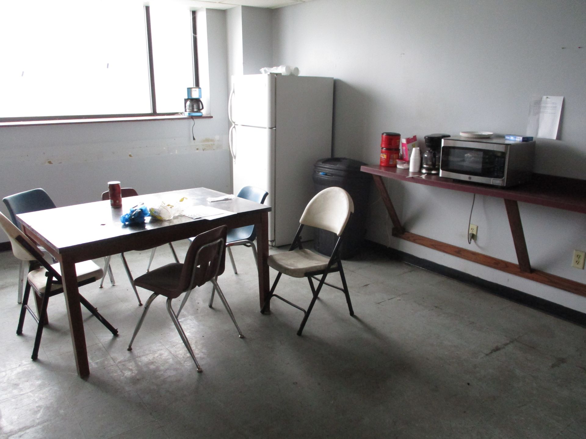 Contents of Lunch Room, Including Table, Chairs, Refrigerator, Coffee Maker, Microwave, and Time