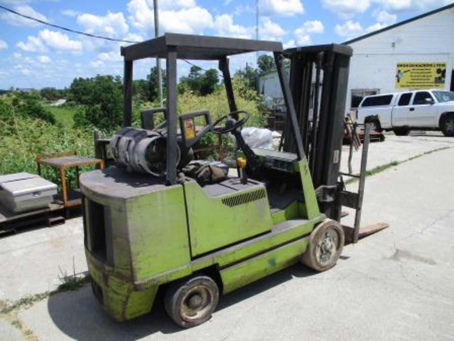 Clark Fork Lift, Estimated 5,000 Lb. Capacity, LP, Hard Tire, 3-Stage Mast, 42" Forks, 6,508 Hours - Image 5 of 6