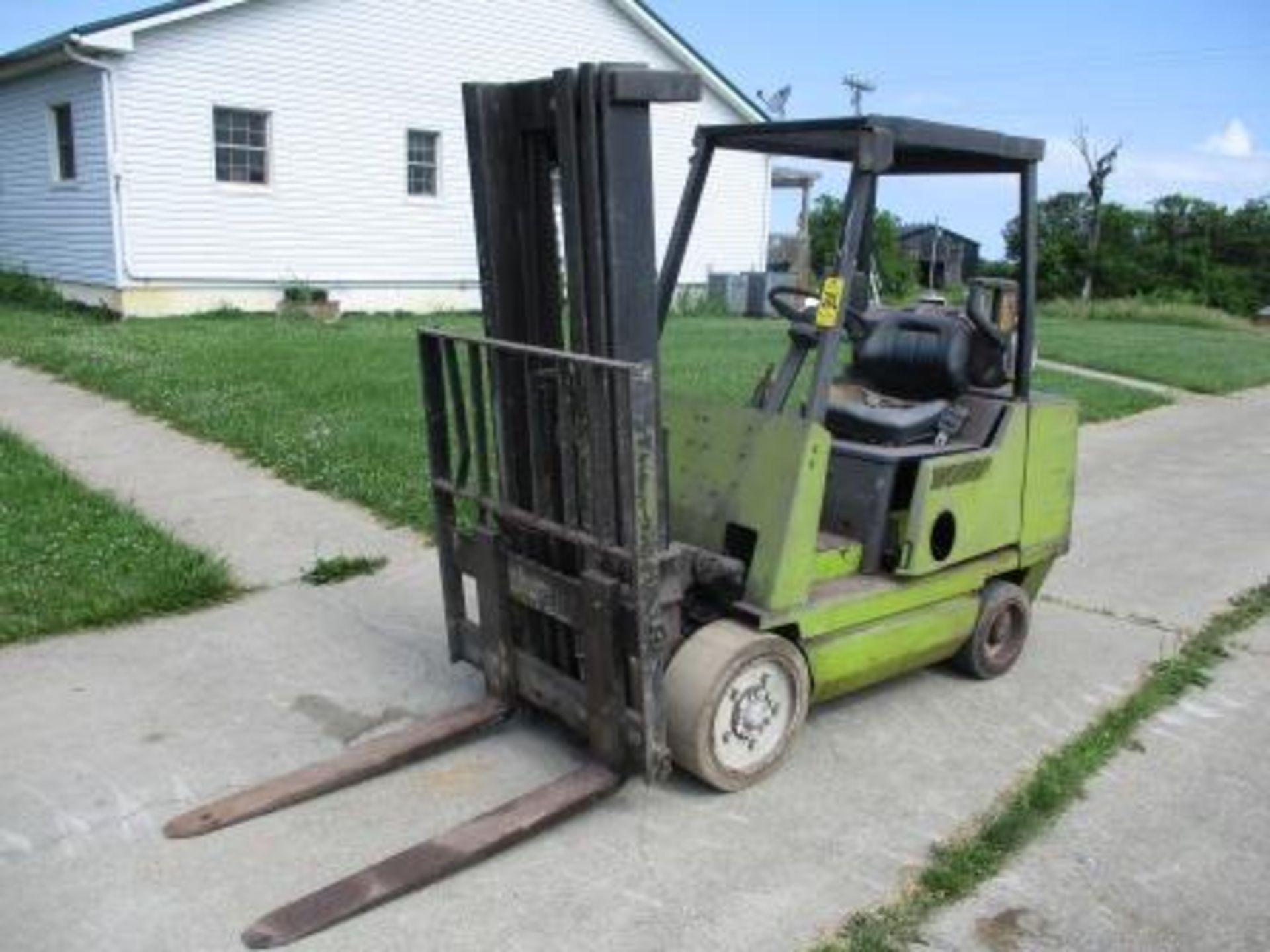 Clark Fork Lift, Estimated 5,000 Lb. Capacity, LP, Hard Tire, 3-Stage Mast, 42" Forks, 6,508 Hours