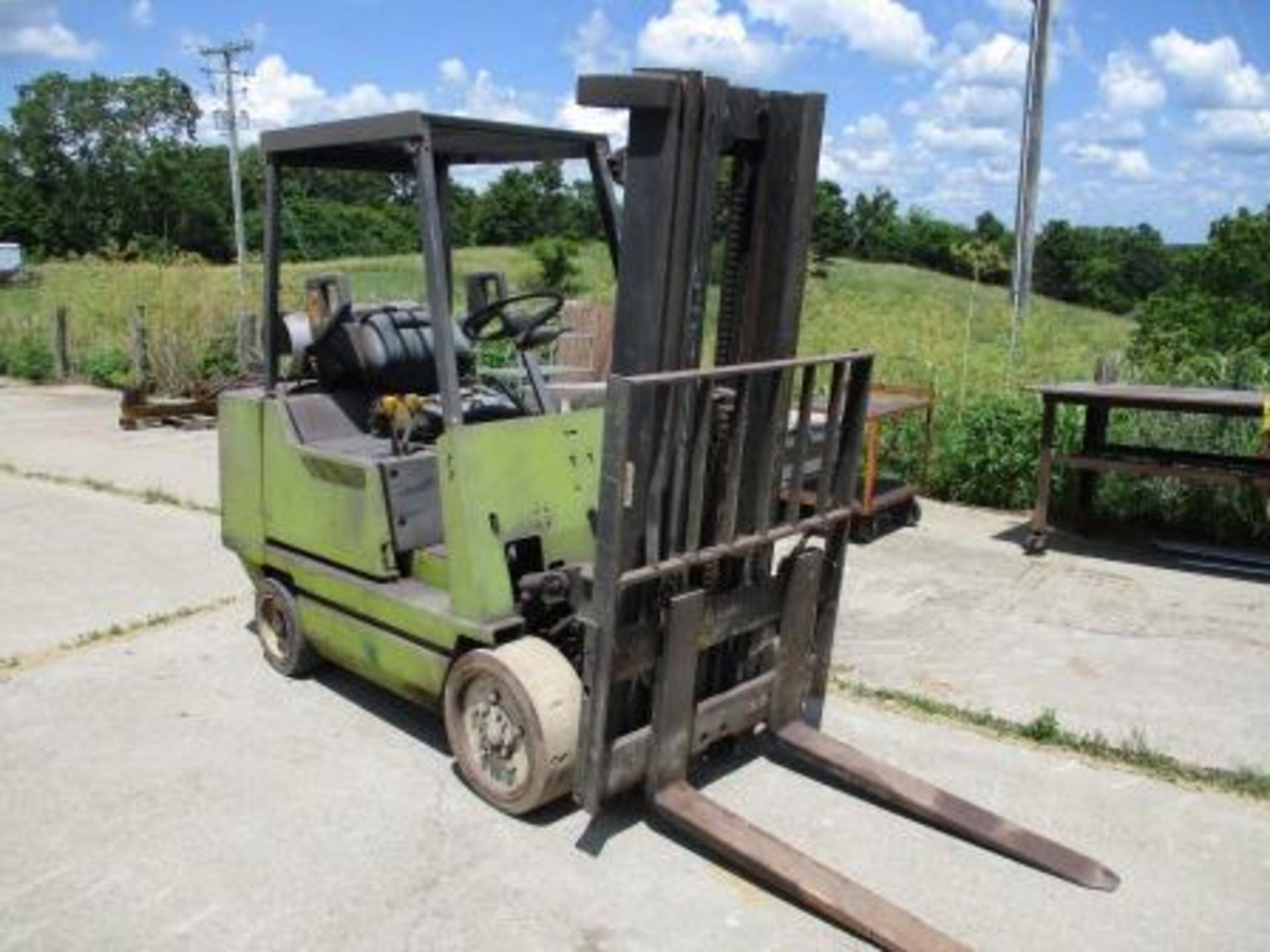 Clark Fork Lift, Estimated 5,000 Lb. Capacity, LP, Hard Tire, 3-Stage Mast, 42" Forks, 6,508 Hours - Image 4 of 6