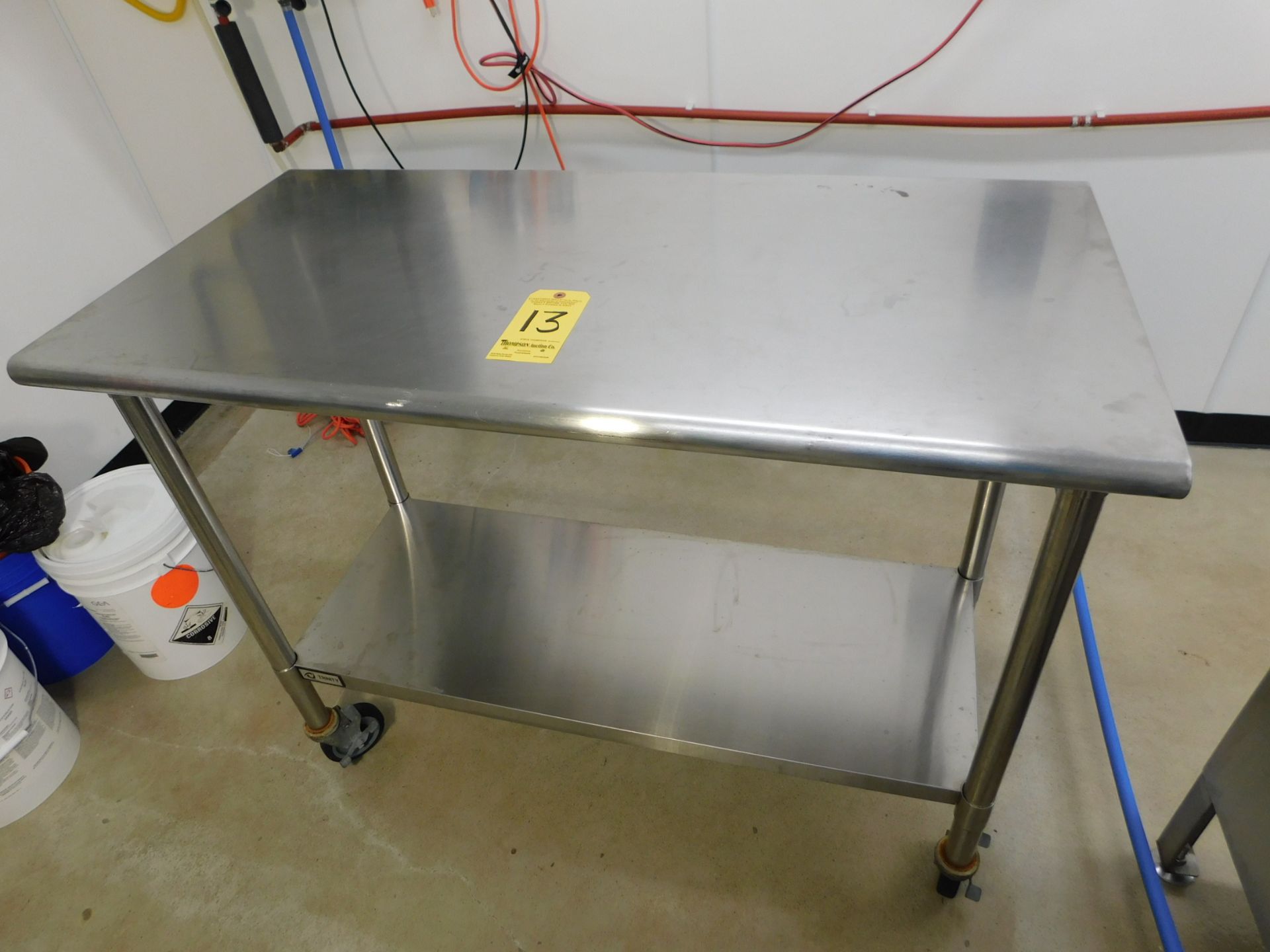 Stainless Steel Table on Casters, with Bottom Shelf, 4' L x 2' W x 3' T