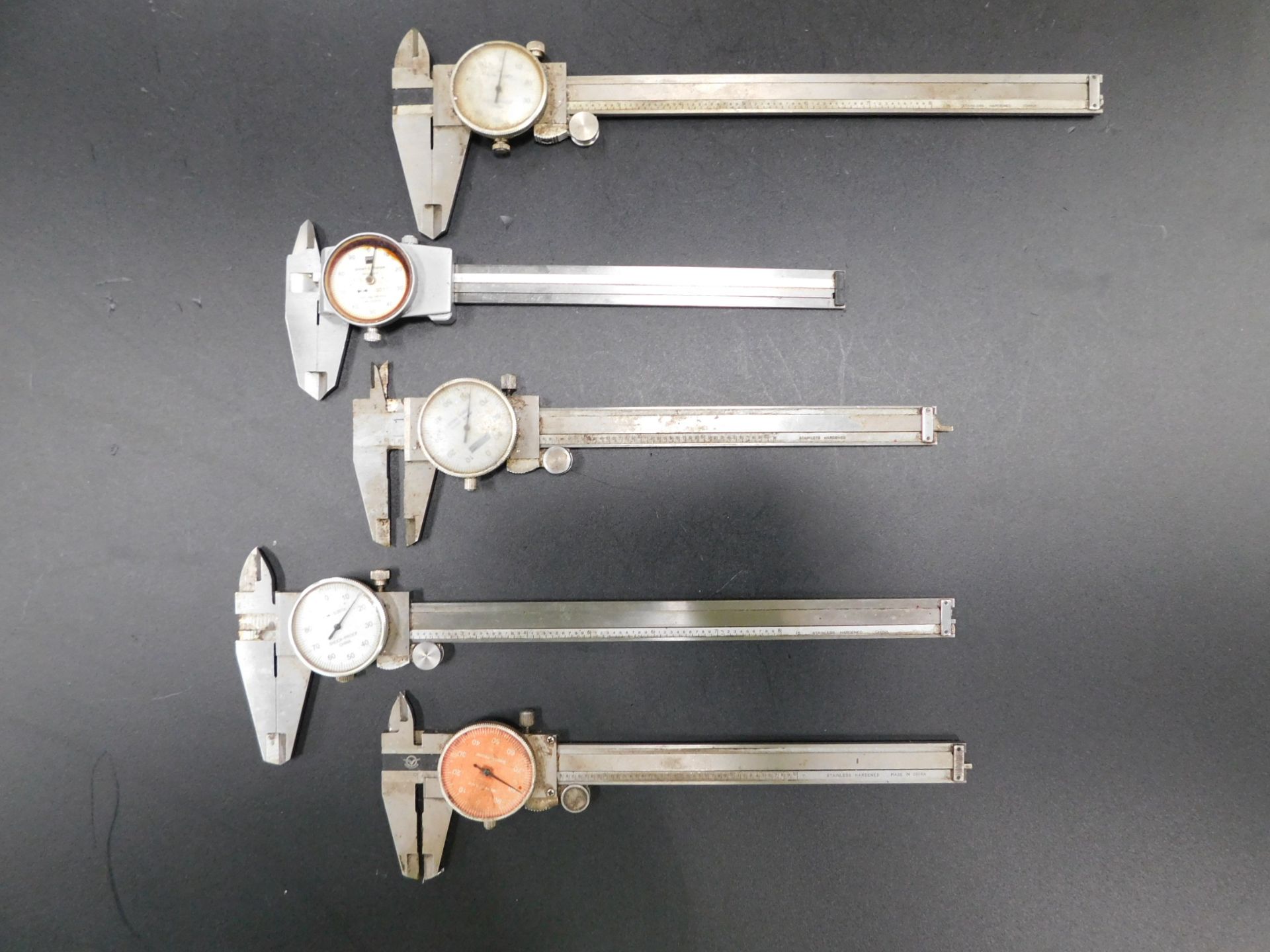 (4) 6" and (1) 8" Dial Calipers