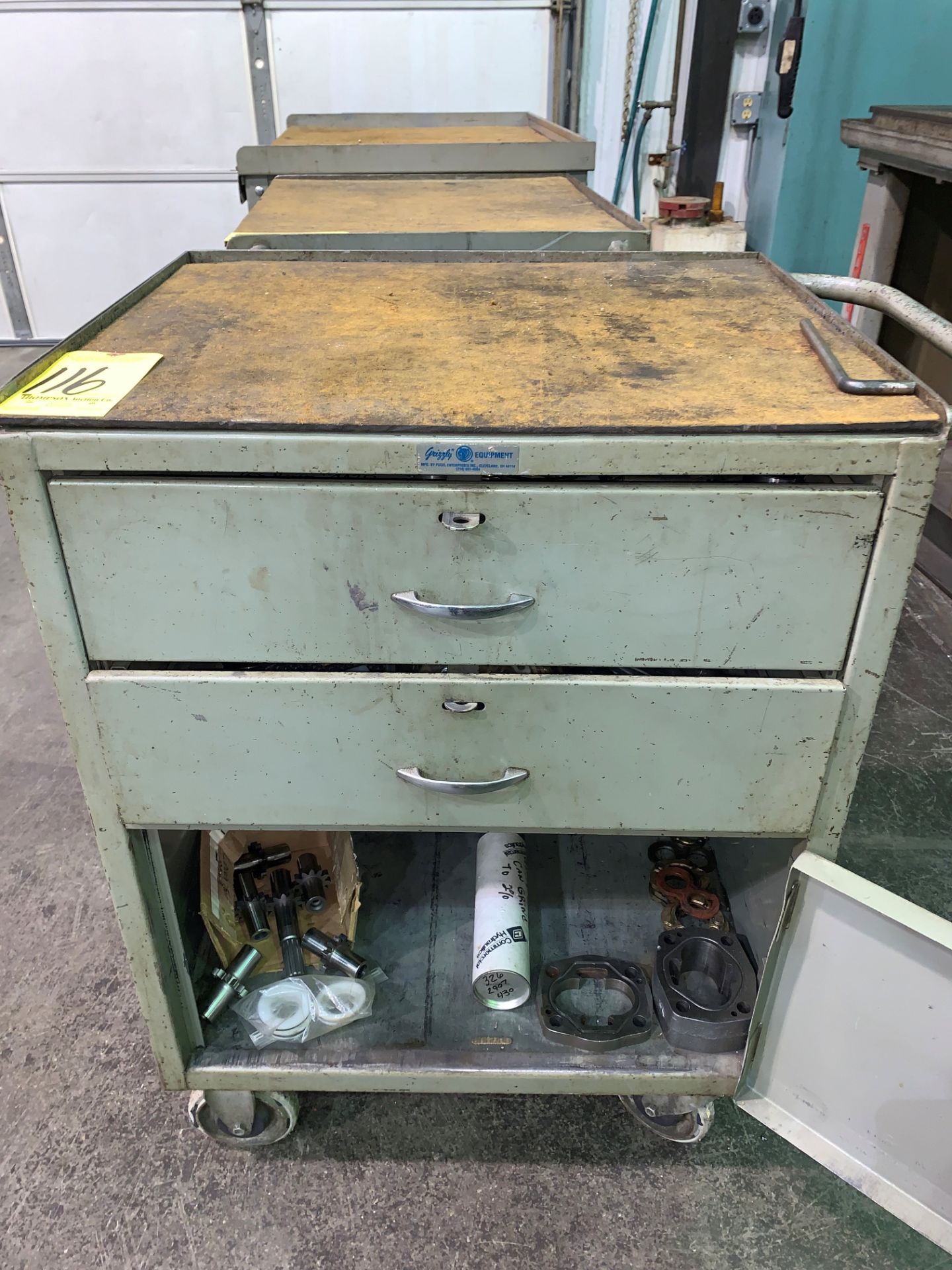 2-Drawer Single Door Rolling Cabinet with Various Die Components and Contents