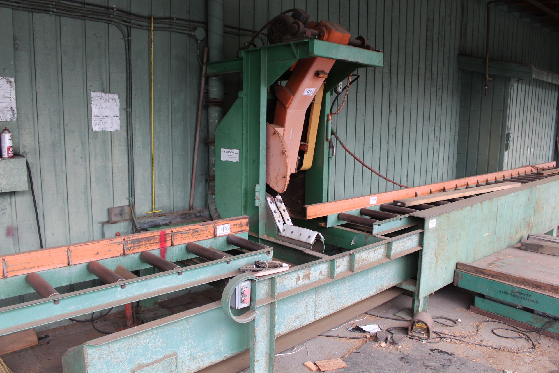 L-M EQUIPMENT 20” SWING SAW W/ 14" X 20' INEED & OUTFEED ROLLCASES; 12" X 33' WASTE BELT CONVEYOR;