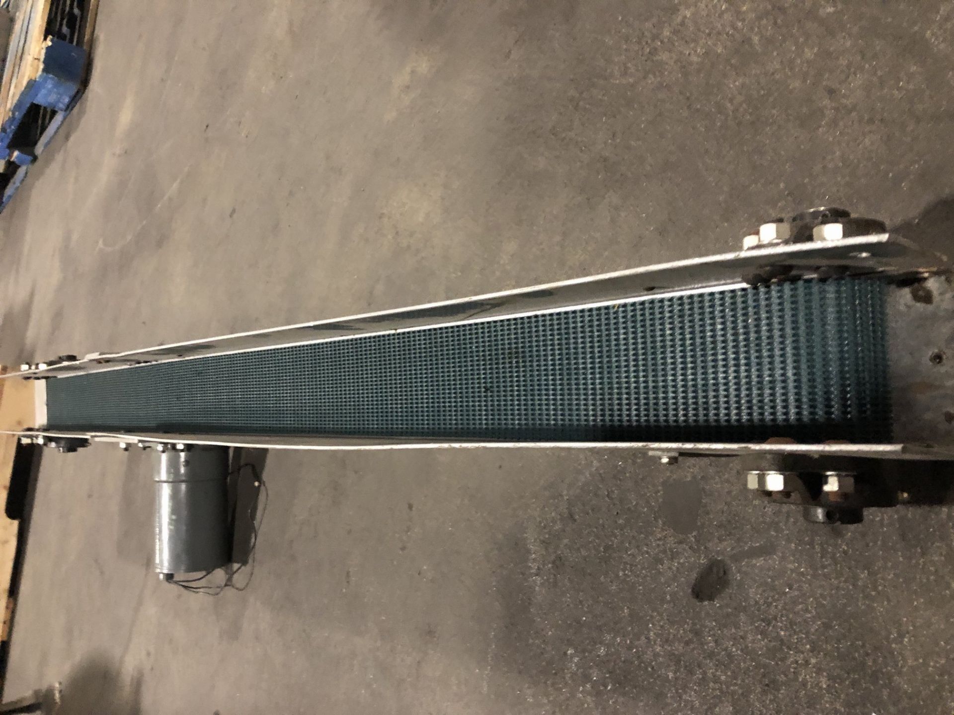 Conveyor with 3.5” wide x 54” long rubber belt conveyor without legs with motor. Located in - Image 3 of 3