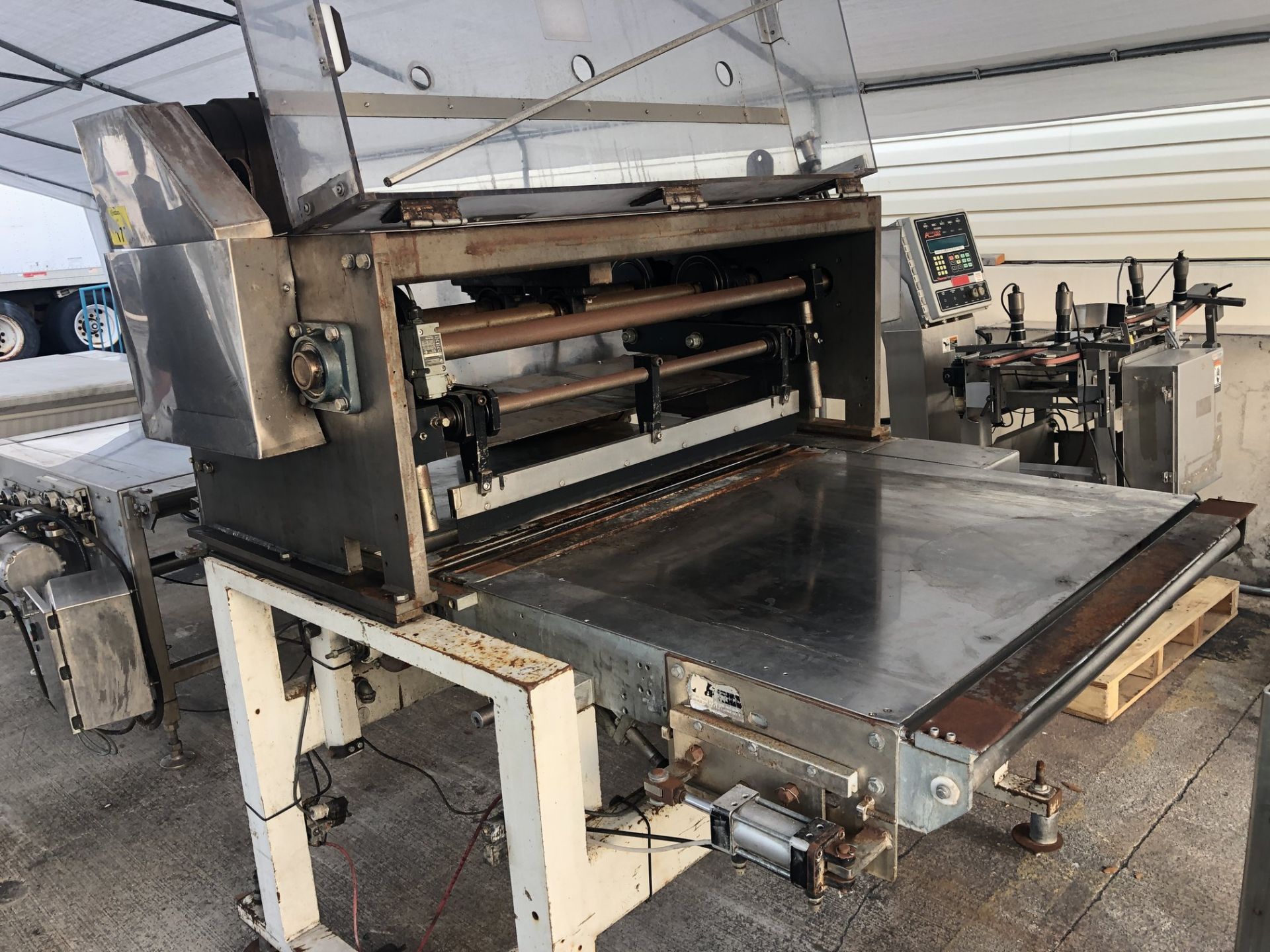 Guillotine Cutter with 40" wide reciprocating knife, 42" wide x 72" long conveyor without belt, with