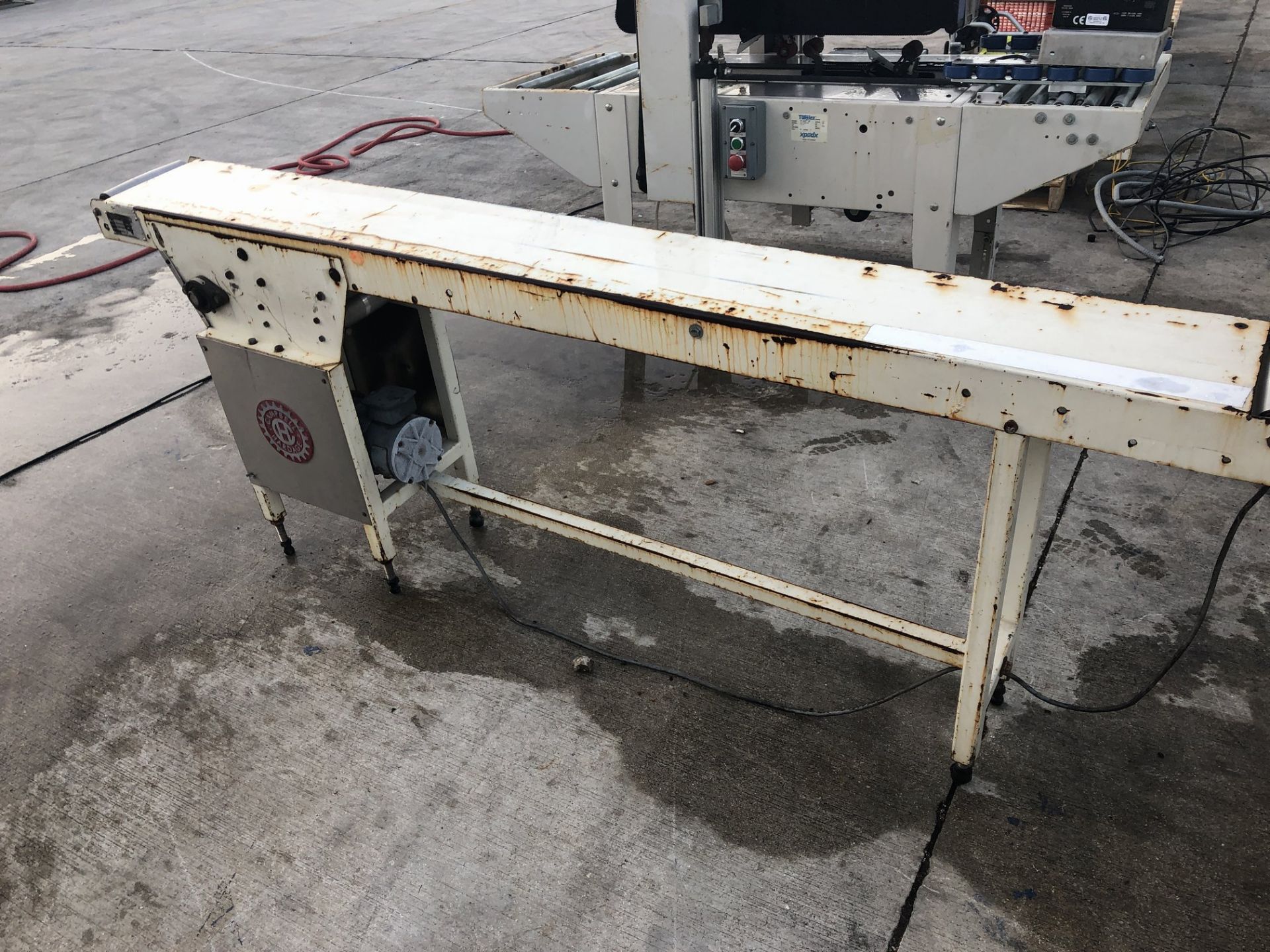 6" wide x 7-ft long conveyor without belt. Loading is free. Skidding or crating fees are