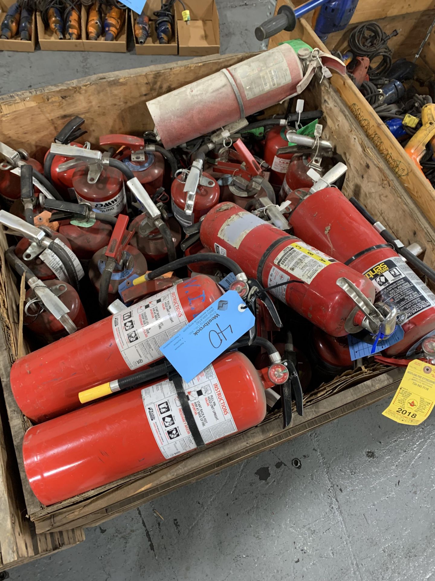 Lot of Various Size Fire Extinguers