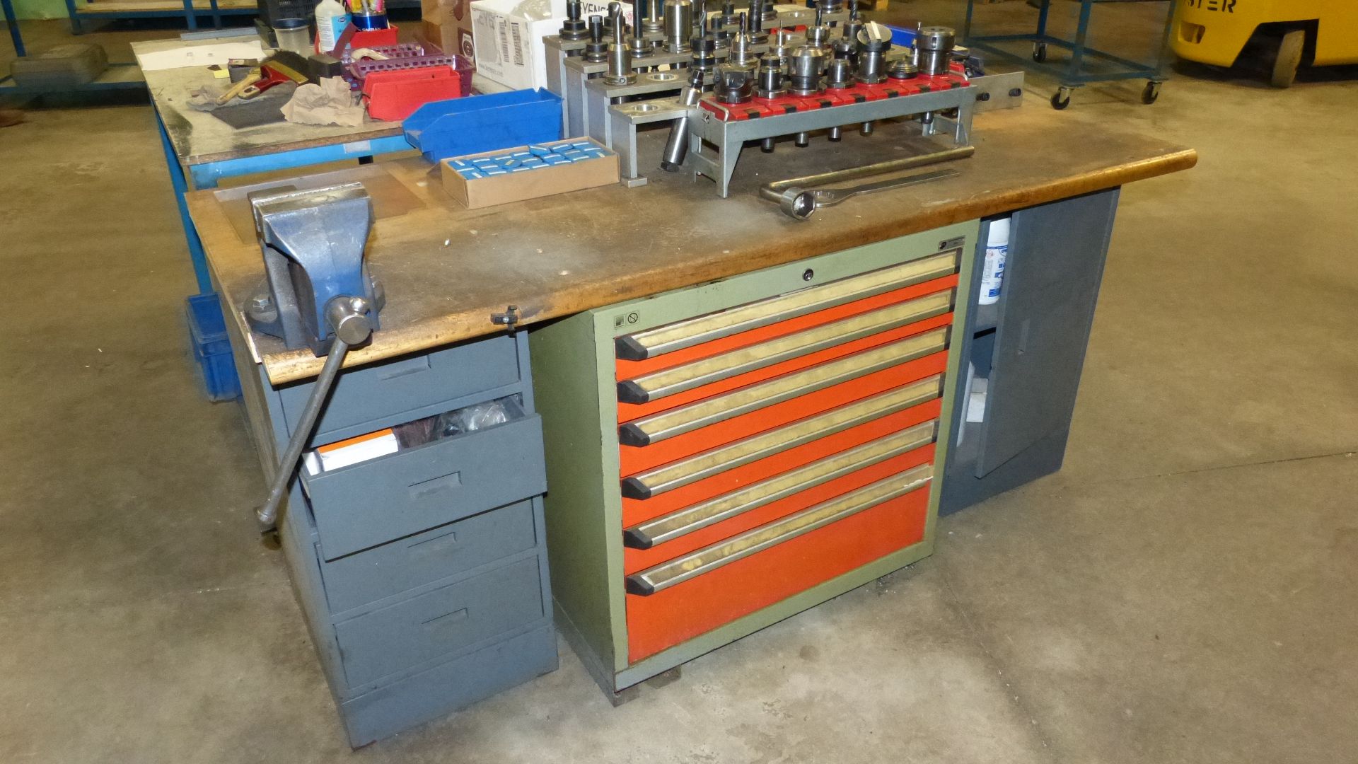 WOOD TOP SHOP TABLE W/METAL BASE, CABINETS, AND VISE (GREEN/ORANGE CABINET NOT INCLUDED)