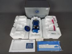 Franklin Mint - a boxed 1:24 scale Limited Edition 'Millenium Collection' New Volkswagen Beetle.