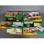 Corgi Classics - Four boxed diecast vehicles from the Corgi 'Showmans Range'.