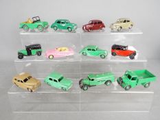 Dinky Toys - A fleet of 12 unboxed diecast vehicles by Dinky Toys.