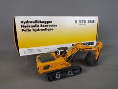 WSI - A boxed 1:50 scale diecast WSI #04-1047 Liebherr R970 SME Litronic Hydraulic Excavator.
