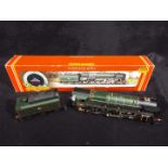 Hornby - A boxed OO gauge R303 Class 9F steam locomotive and tender Op.No.