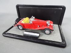 Franklin Mint - A boxed 1:24 scale Mercedes 500K Special Roadster by Franklin Mint.