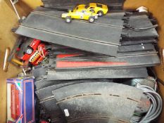 Scalextric - A quantity of vintage Scalextric track and accessories including an unboxed