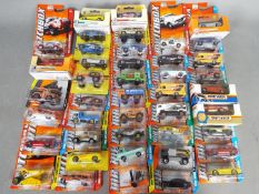 Matchbox - Approximately 40 boxed / blister carded modern issue Matchbox diecast vehicles.