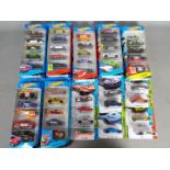 Hot Wheels - A collection of Seven 5 Car Hot Wheels packs with 11 carded Hot Wheels .