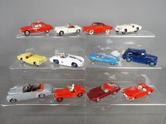 Dinky Toys, Corgi Toys - A group of 12 repainted / restored diecast vehicles.