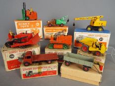 Dinky Toys - A grouping of eight boxed diecast vehicles by Dinky Toys.