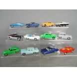 Dinky Toys, Corgi Toys - A group of 12 repainted / restored diecast vehicles.