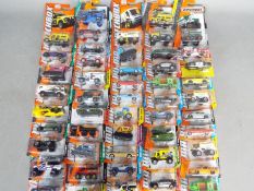 Matchbox - Approximately 50 boxed / blister carded modern issue Matchbox diecast vehicles.