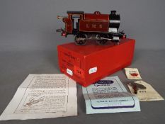 Hornby - A boxed Hornby O Gauge Clockwork Train #101. The 0-4-0 Tank Locomotive Reversing ERA3 Op.