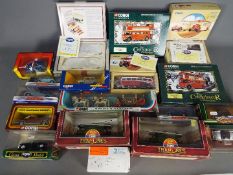 Corgi, Matchbox Dinky - A grouping of boxed diecast vehicles in various scales.